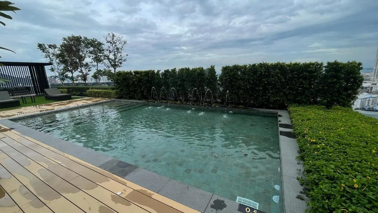 ג'ורג' טאון Beacon Executive Suites #Cozyfamilystay #Rooftoppool #13 ג'ורג' טאון